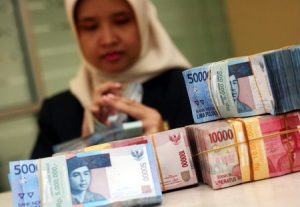 Rupiah Melemah 100 Poin, Tembus Rp14.273