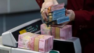 Rupiah Menguat Perlahan ke Level Rp14.447