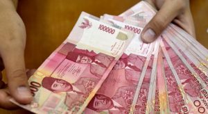 Tertekan Pidato The Fed, Rupiah Dibuka Melemah Rp14.392 per Dolar AS