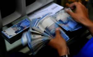 Rupiah Menguat Tipis Rp14.409/USD