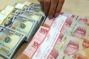 Rupiah Dibuka Melemah di Level Rp 14.618/USD