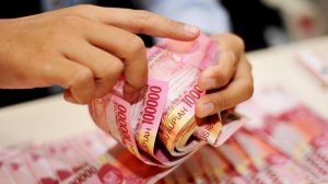 Rupiah Bergerak Melemah di Level Rp 14.800/USD