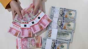 Rupiah Melemah Dekati Level Rp14.000/USD