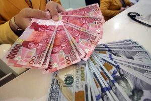 Rupiah Menguat Rp 13.900 per Dolar AS