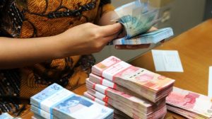 Rupiah Melemah ke Rp14.451/USD Pagi Ini