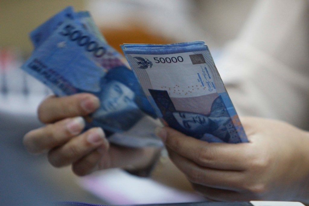 Rupiah Tertekan ke Rp14.095 per USD