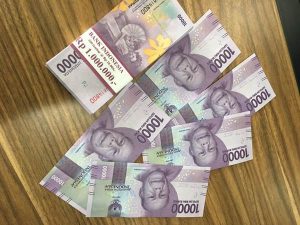 Rupiah Dibuka Melemah ke Rp14.075/USD