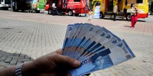 Rupiah Menguat Tipis ke Rp14.050/USD