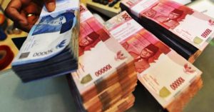 Jelang Pengumuman Suku Bunga BI, Rupiah Berada di level Rp13.900-an per USD.