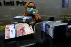 Jelang Weekend, Rupiah Menguat ke Rp14.033/USD