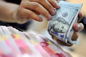 Rupiah Melemah ke Rp13.706/USD